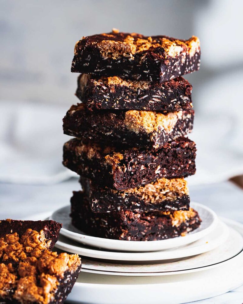 Stack of brookie bars with crumble topping