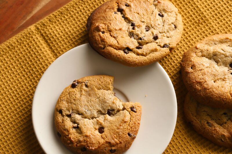 Gluten-free chocolate chip cookies on a small white plate