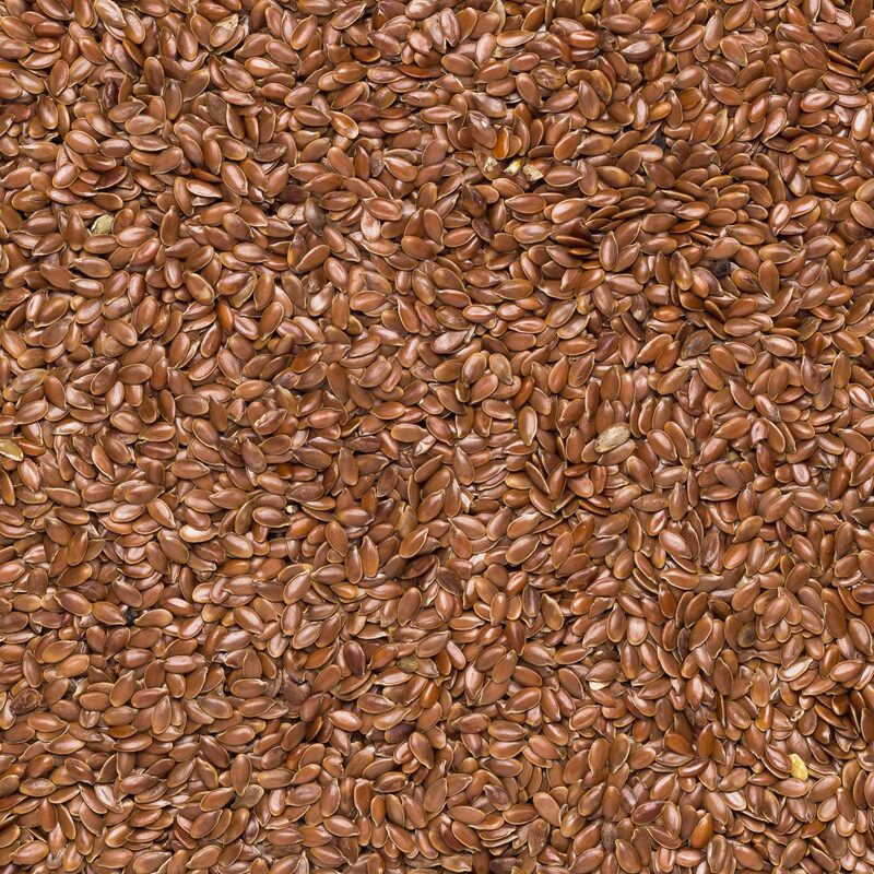 Close-up of whole brown flax seeds