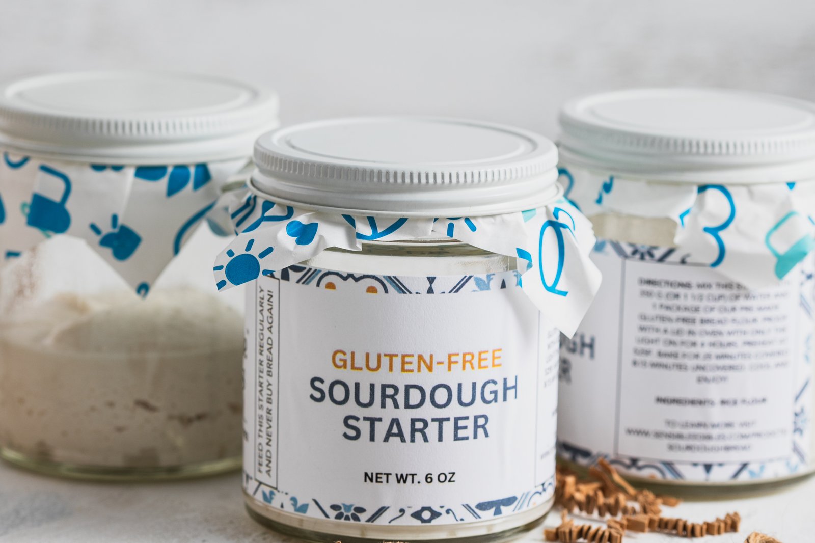 A bubbling gluten-free brown rice sourdough starter in a mason jar