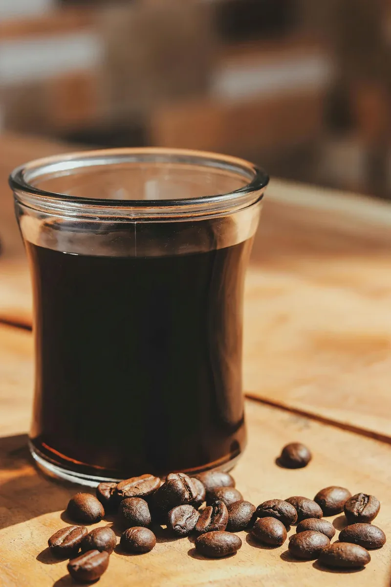 Glass of cold brew over ice, ready to drink