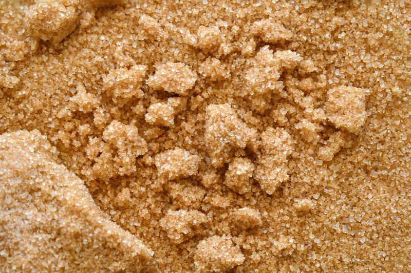 Close-up of damp brown sugar crystals
