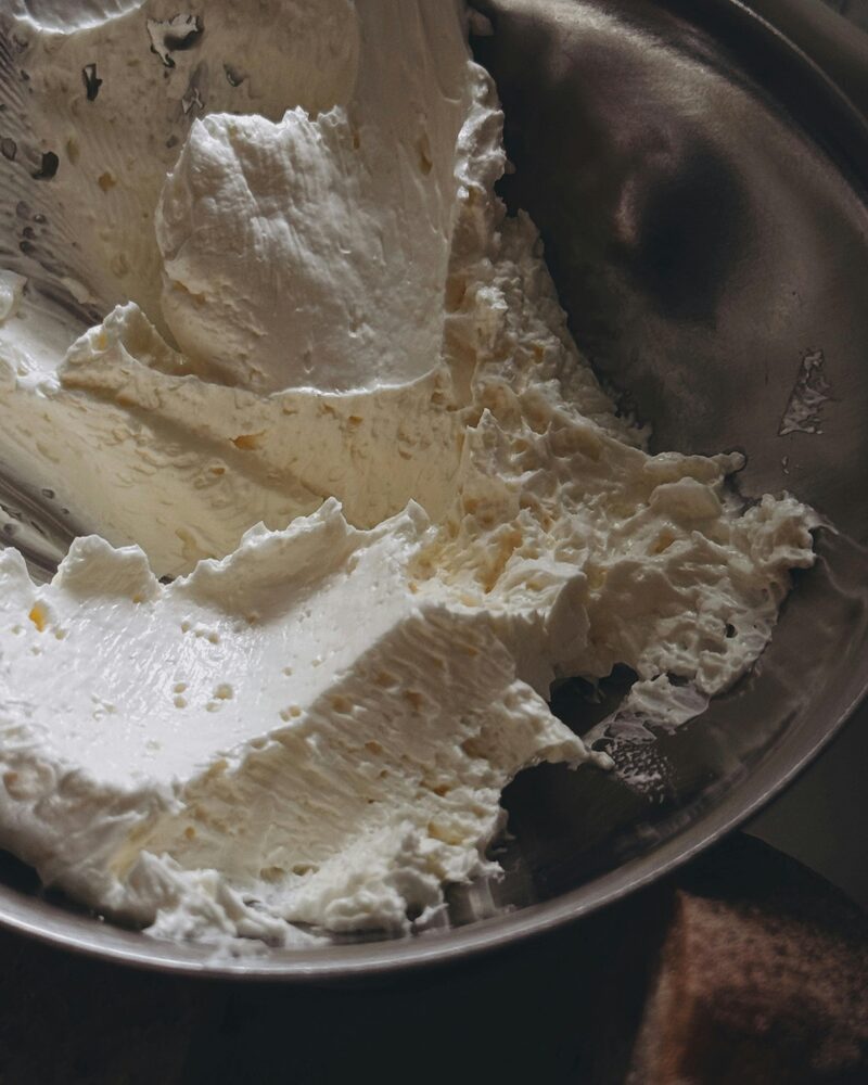 A bowl of thick, whipped vegan heavy cream